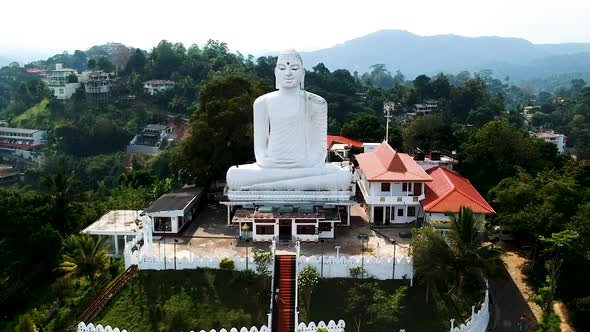 Aerial of Big White Buddha statue in Kandy. Bahirawakanda Vihara Buddha Statue, Kandy, Sri lanka