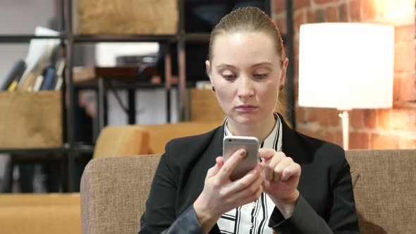 Business Woman Using Smartphone