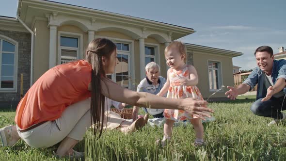 Happy Toddler Girl Learning Walking alt