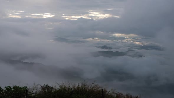 Slow motion landscape view of mountains and sea of fog
