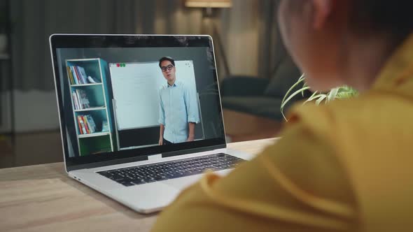 Girl Student Distance Learning With Online Teacher On Computer Screen