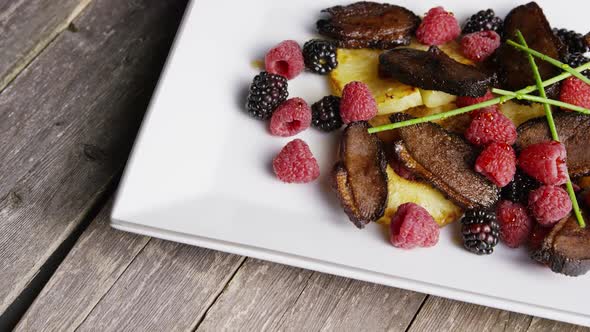 Rotating - smoked duck bacon with grilled pineapple, raspberries, blackberries and honey 