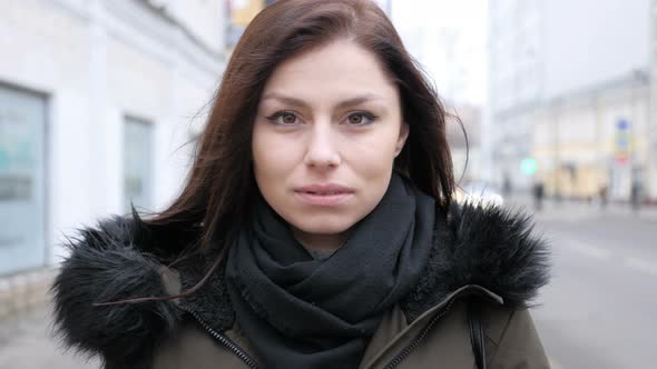 Portrait of Upset Sad Young  Woman on Street