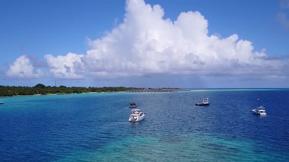 Drone tourism of resort beach by blue sea with sand background