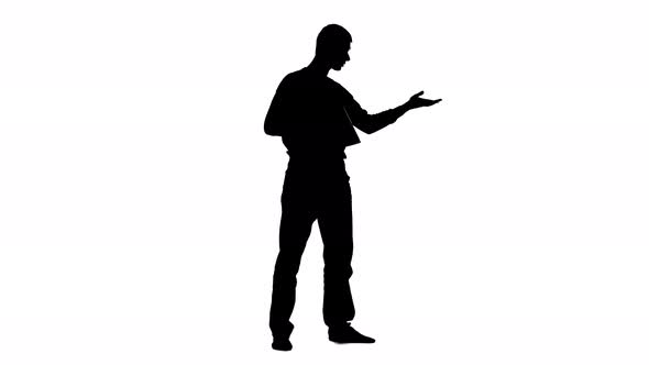 Man Speaks in a Shout on the Set. Silhouette. White Background