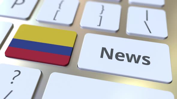 News Text and Flag of Colombia on the Keys