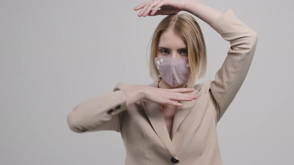 Portrait of Sensual Female Model in Stylish Face Mask