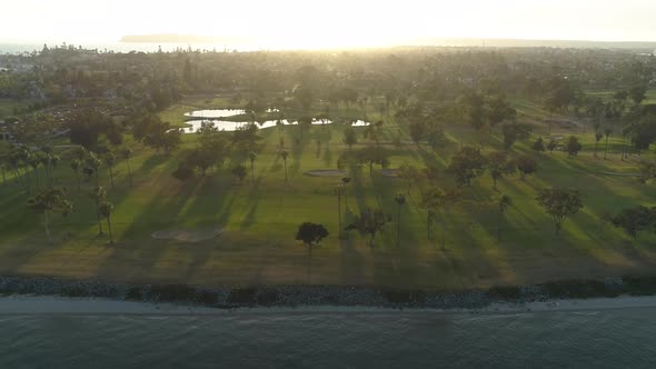 Aerial view of a park along a coast alt
