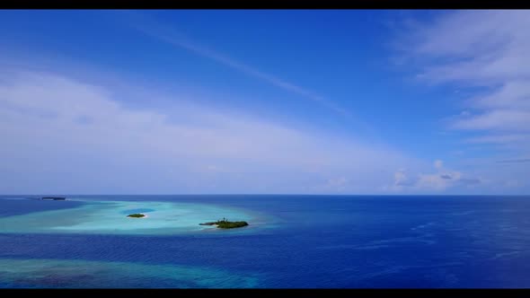 Aerial sky of luxury coastline beach holiday by blue sea and clean sandy background of a picnic afte