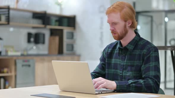 Beard Redhead Man with Laptop Showing No Gesture Disapprove