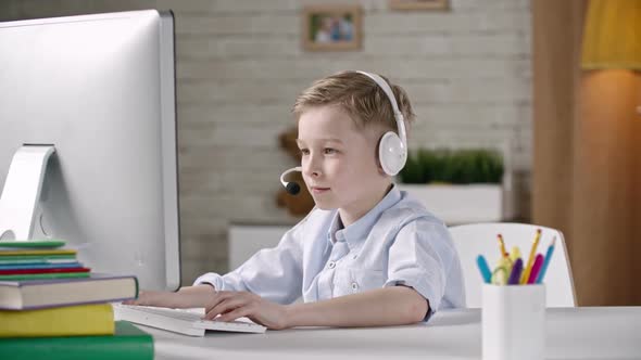 Kid Using Computer for Communication