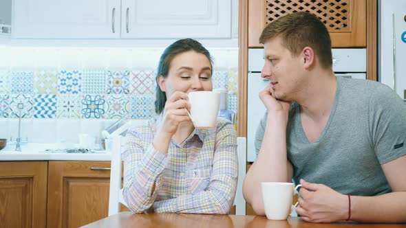 Couple Holding Cups, Drinking Coffee or Tea