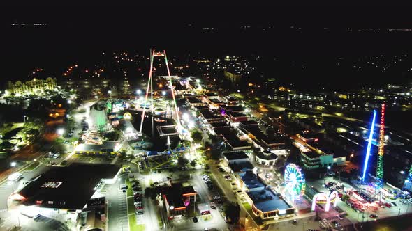 Old Town amusement park in Kissimmee, Orlando. Aerial night orbit view