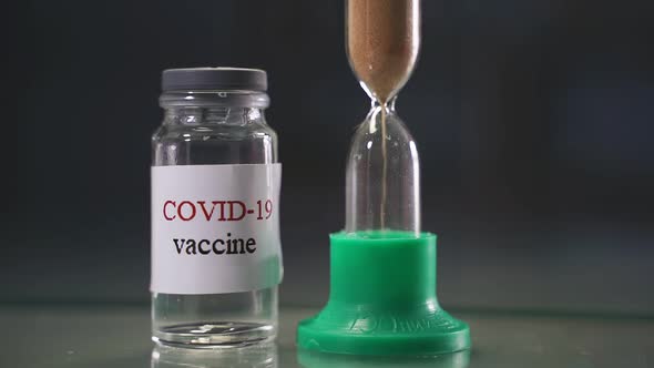 Closeup of a Bottle Containing the COVID19 Coronavirus Vaccine a Cure for the Pandemic