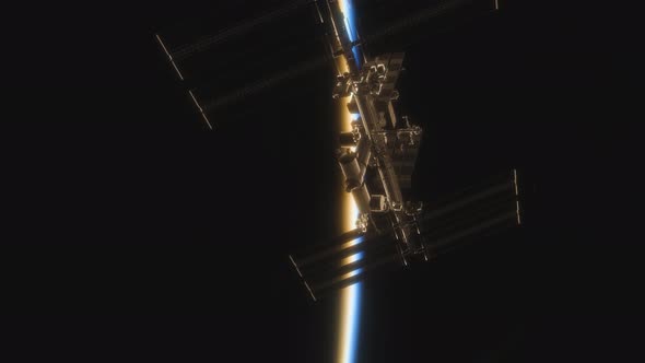 Animation of the International Space Station ISS Floating in Orbit Above Planet Earth in Outer Space