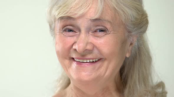 Positive Grey-Haired Pensioner Laughing Camera, Cheerful Retired Lady, Good Mood