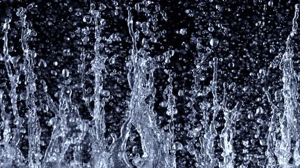 Super Slow Motion Shot of Water Splash Isolated on Black Background at 1000Fps