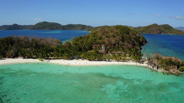 Aerial view of Malcapuya Beach island in a sunny day, Coron, Palawan, Philippines