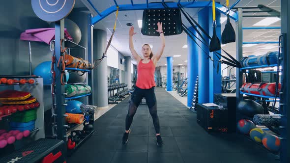 Woman exercise workout in gym. Woman doing fitness and yoga exercises