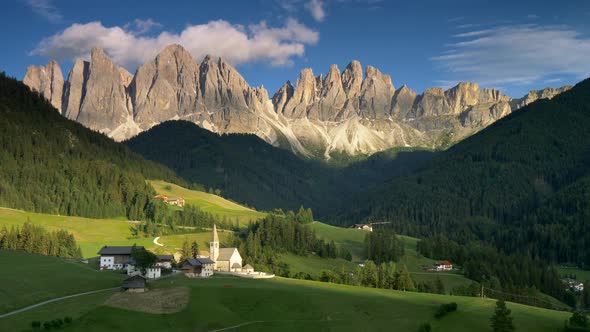 Val Di Funes Valley, Santa Maddalena Touristic Village in Dolomites, Italy, Panning Shot