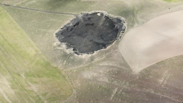 Coil mine hole from air