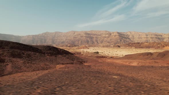 High speed side to side aerial drone shot of a big desert, great transition for fast paced travel vi