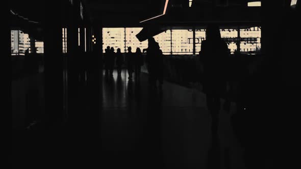 Silhouettes of People Customers Inside Shopping Mall Center in Slow Motion