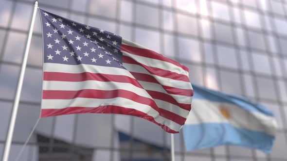 Waving Flags of the USA and Argentina in Front of a Skyscraper alt