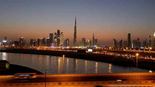 Aerial hyperlapse of Dubai skyscrapers during scenic sunset, Dubai, U.A.E.