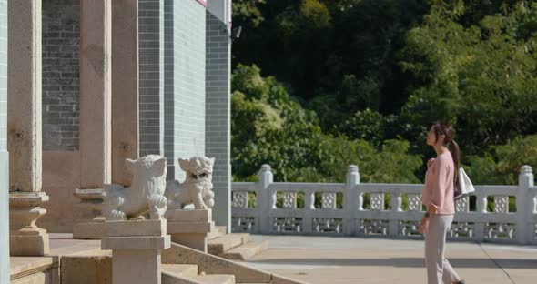 Woman visit traditional chinese temple