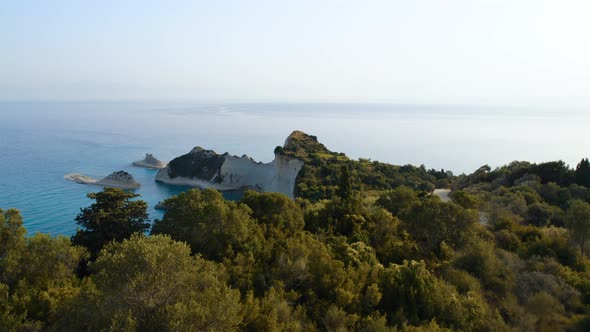 Drone Over Coastline Cliffs And Sea At Sunrise Of Cape Drastis