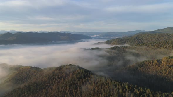 Aerial panorama over Foggy Mountain Landscape