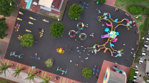 Children Play on the big playground Aerial View 4 K