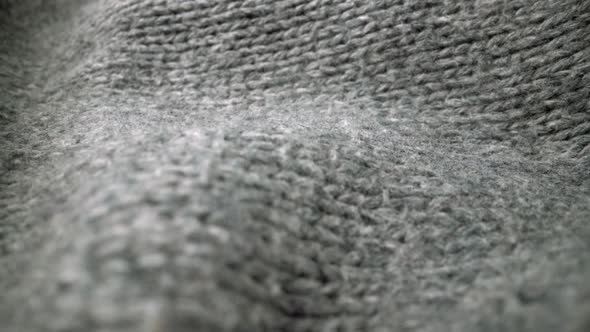 Extreme Detail View of Sheep Wool Cloth Texture Flowing in Macro Dolly Shot