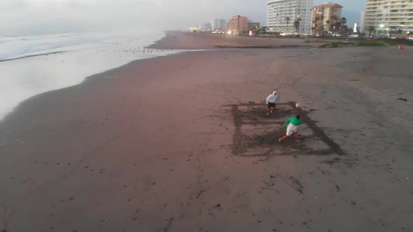 Sunset, Beach volleyball, pacific ocean coast (La Serena, Chile) aerial view