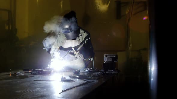 Welder welding a metal