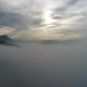 Aerial view of the Swiss Alps, through cloud cover at sunset in Entlebuch, Switzerland - VideoHive Item for Sale