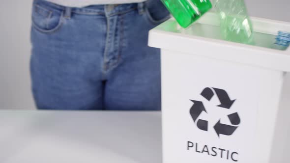Sorting Plastic Bottles Into Container