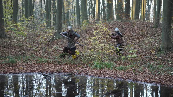 Viking warriors running with their weapons out