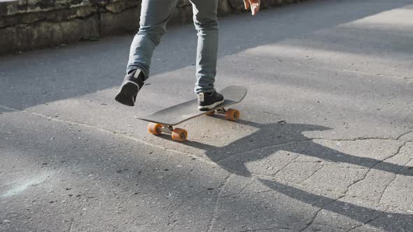 Skateboard Pro Flip Trick in Park Kickflip in Hand Drop Out to Nosemanual Hardflip Out