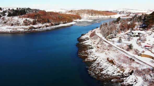 Beautiful river and snowy landscape during winter 4k