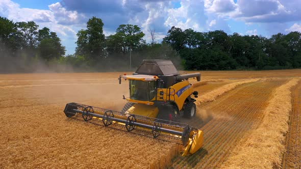 Combine harvester in action on the field.