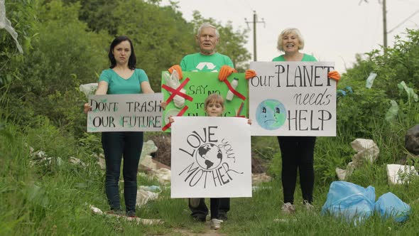 Volunteer Team Holding Encouraging Posters. Calls Out Slogans. Reduce Trash Cellophane Pollution