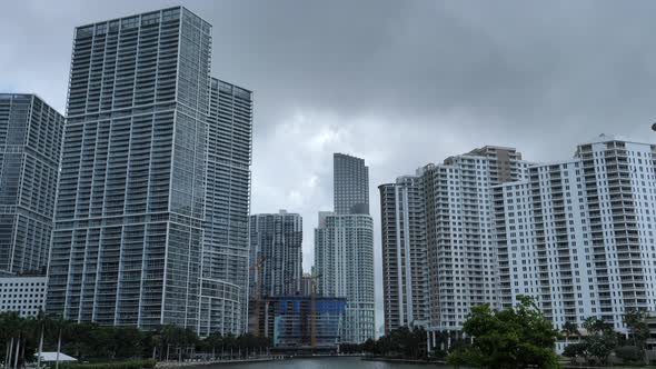 Miami cityscape on cloudy day. Tilt up