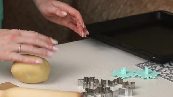 A Woman Mixes A Lump Of Dough For Making Biscuit Cookies.