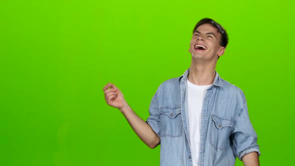 Guy Jokes, He Is Not Bored, He Is Happy and Positive. Green Screen