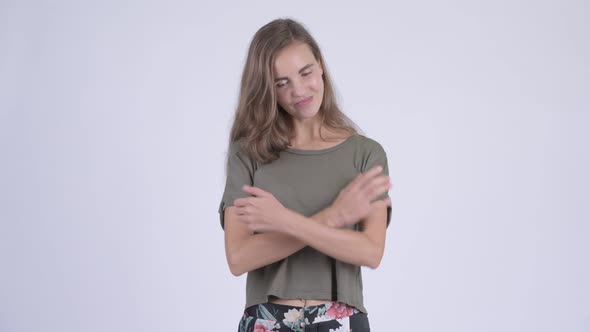 Stressed Young Angry Woman with Arms Crossed