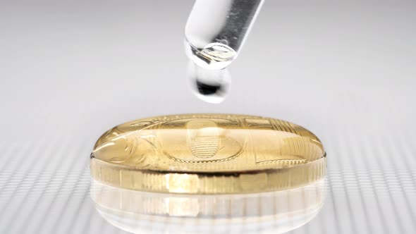 A Coin with Water Shows the Surface Tension of the Water