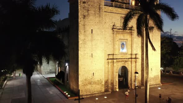 Aerial ascending nighttime extreme closeup of the towers of the Cathedral de San Gervasio in Vallado