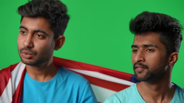 Two Stressed Disappointed Football Fans on Green Screen Watching Match Sighing Talking